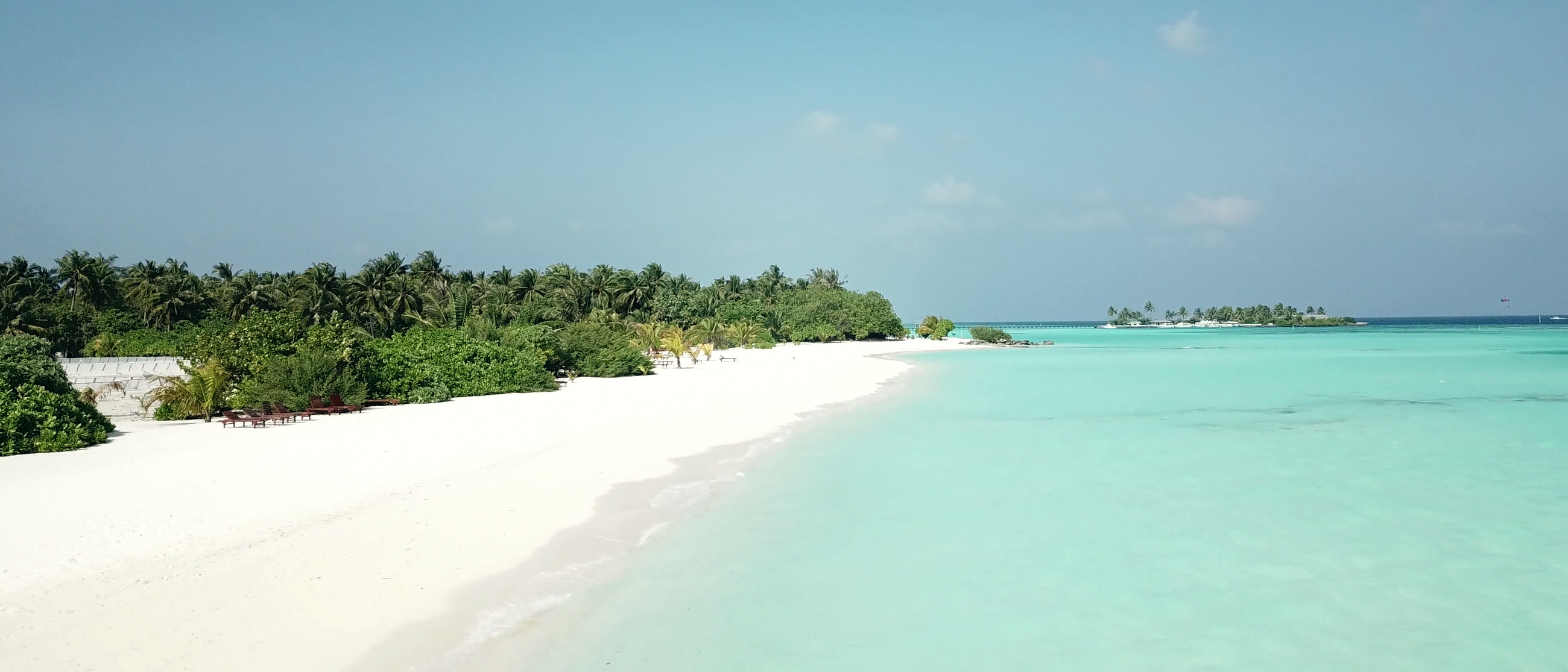White sand beach and a turquoise lagoon in the Maldives